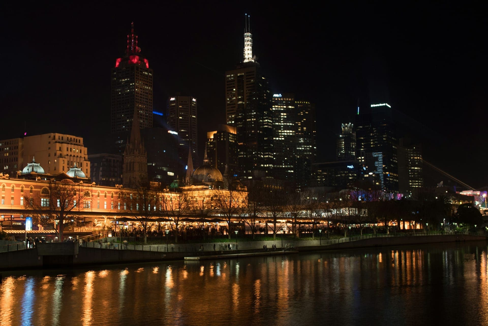 Melbourne city skyline at night across the Yarra River