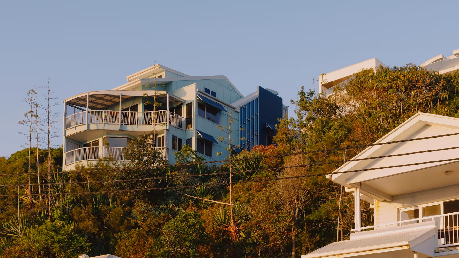 Prestige homes and tree-lined streets in North Brisbane